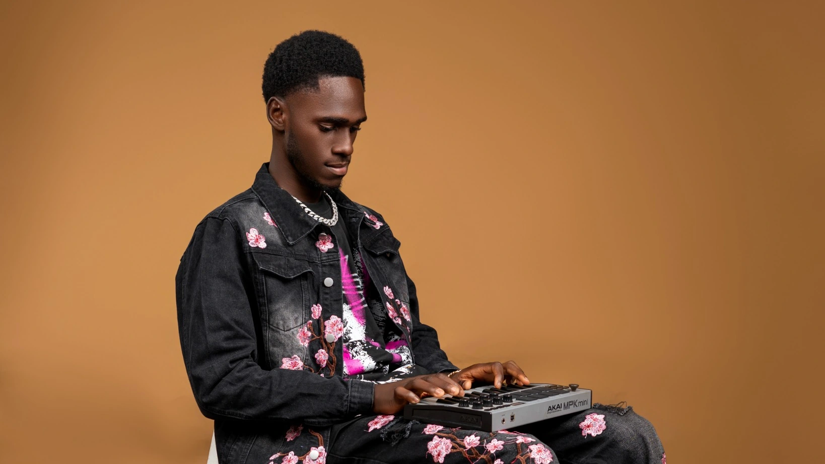 Mertz Beatz producing music with an Akai controller