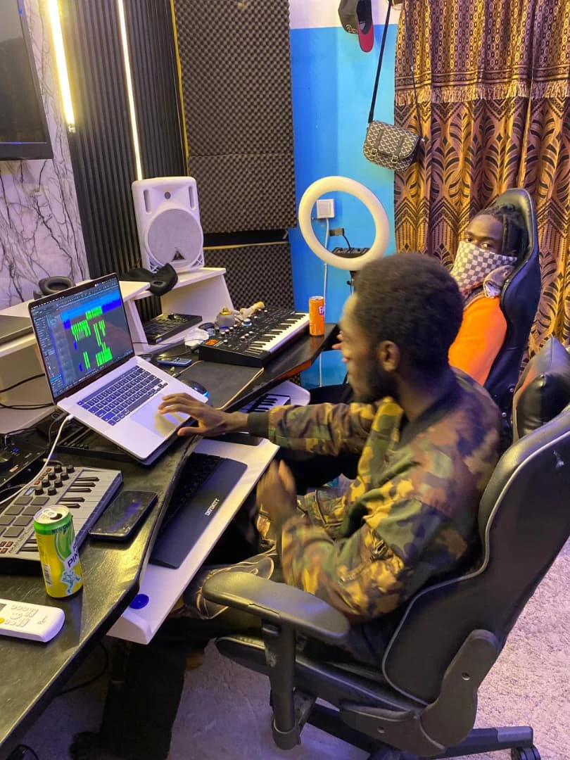 Mertz working in the recording studio in The Gambia